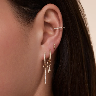 Schitter deze lente: jouw gids voor het kiezen en combineren van gouden sieraden